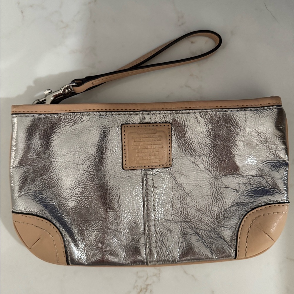 Silver and Tan Women's Coach Clutch